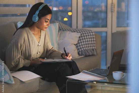 Female adult student studying at home
