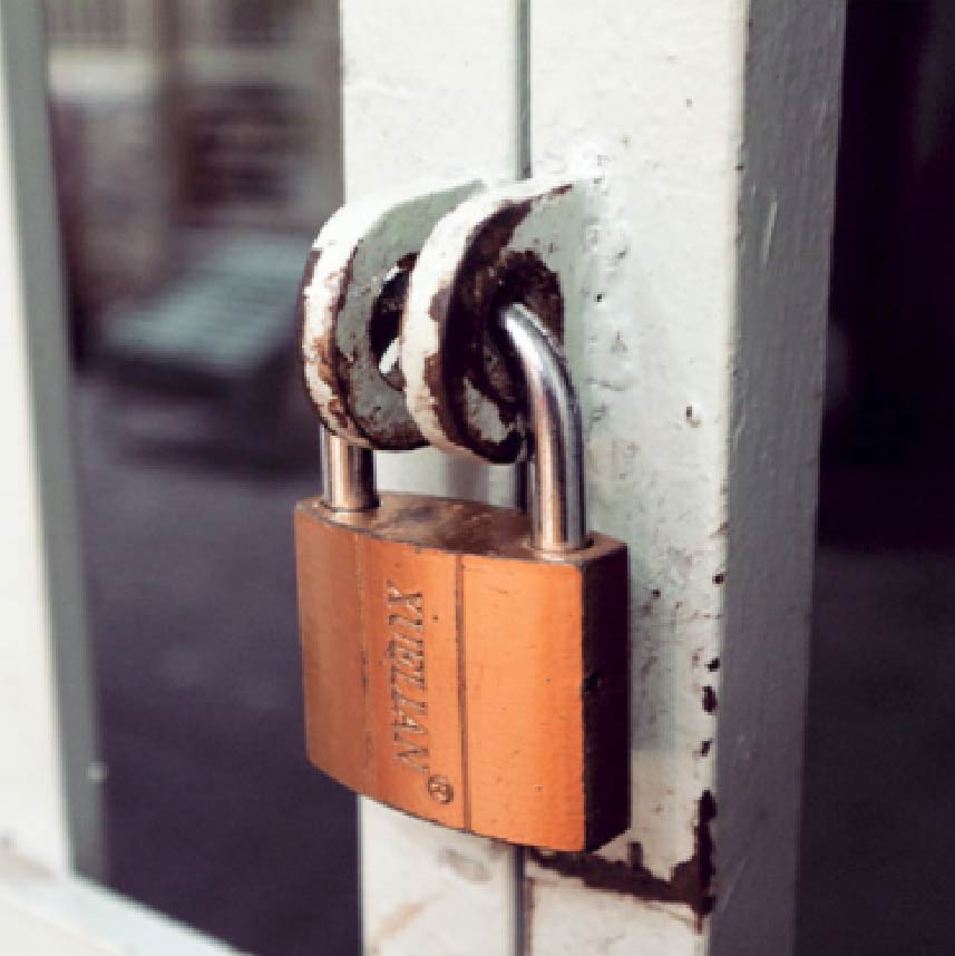 A padlock on a gate