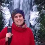 Barbara Wildham in front of a waterfall